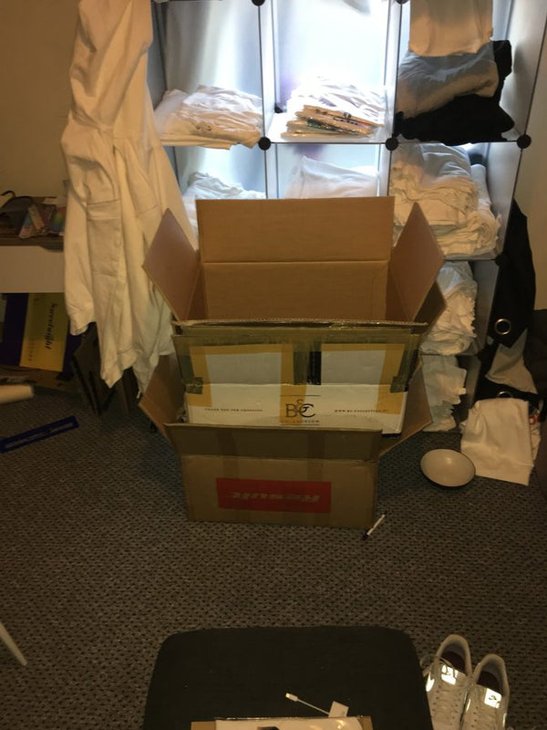 Blank tees and boxes of stock